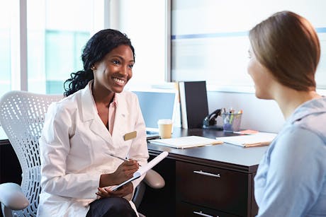 Doctor discussing a Pap test for cervical cancer screening